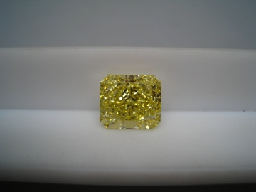 Natural-Fancy-Vivid-Yellow-Even-VS2-VG-VG-Fluo-None 25.9 Cts